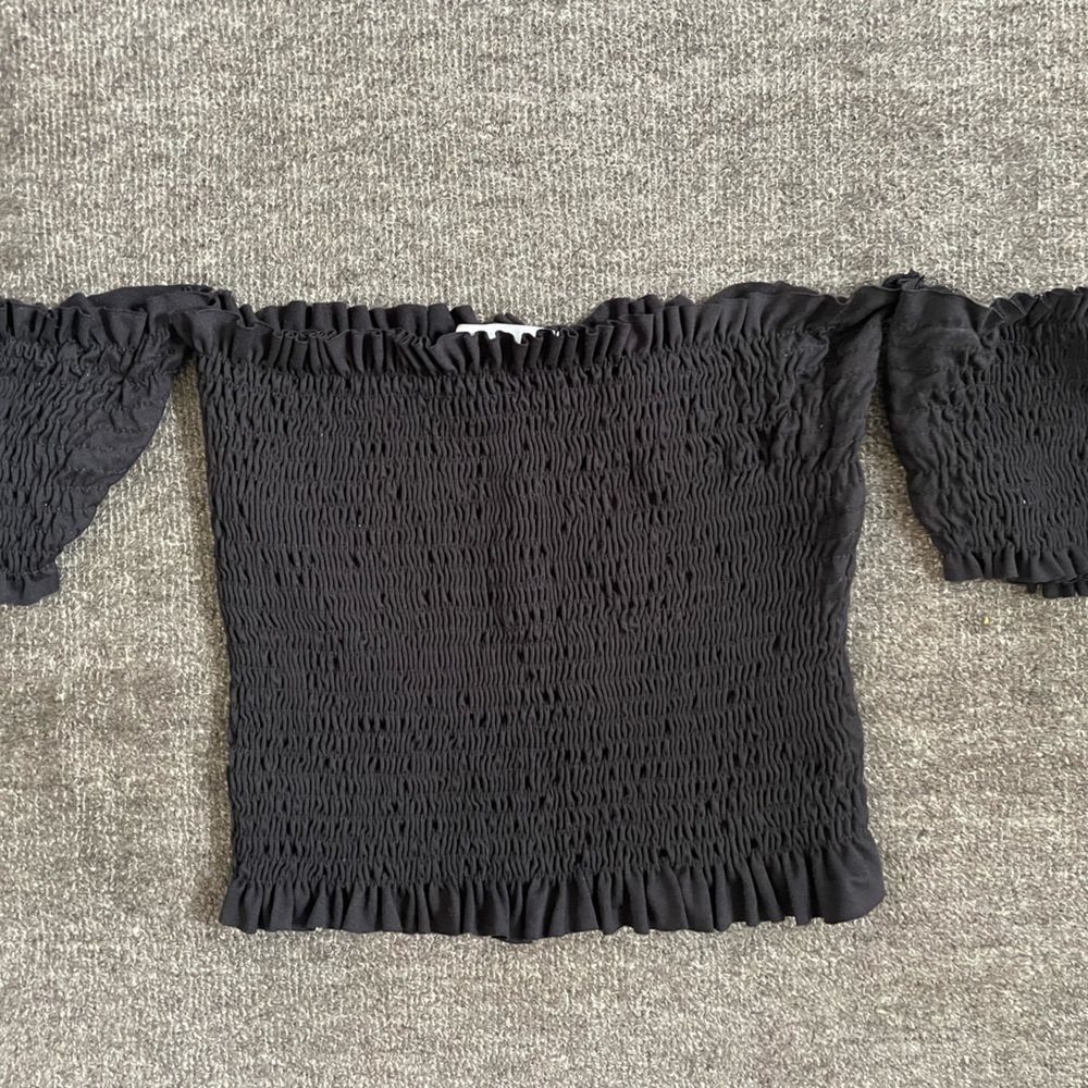 Off-the-shoulder black top